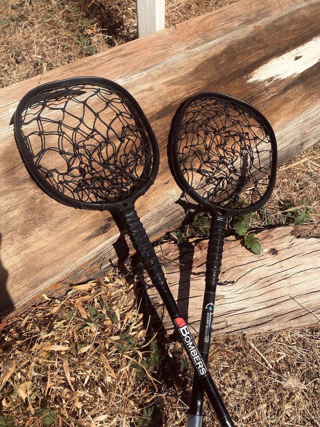 Bombers Square Plastic Sharp Shooter Racket